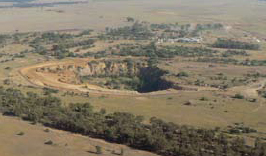 Aerial view of mine site showing old workings