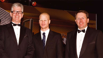 Brian Bruce and Andrew Skudder announcing the Murray & Roberts sponsorship of Hilton Langenhoven (centre) at the 2008 Jack Cheetham award ceremony