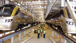 On 23 July, a group of 130 bursary students, lecturers from various universities and entity co-ordinators were treated to a Gautrain in site visit. The visit included an overview presentation on the project, a visit to Marlboro Station, the viaduct at Jean Avanue and the train dept in Midrand. Students were given a chance to see the train up close, sit in it and marvel the the mechanics behind this amazing projects. 